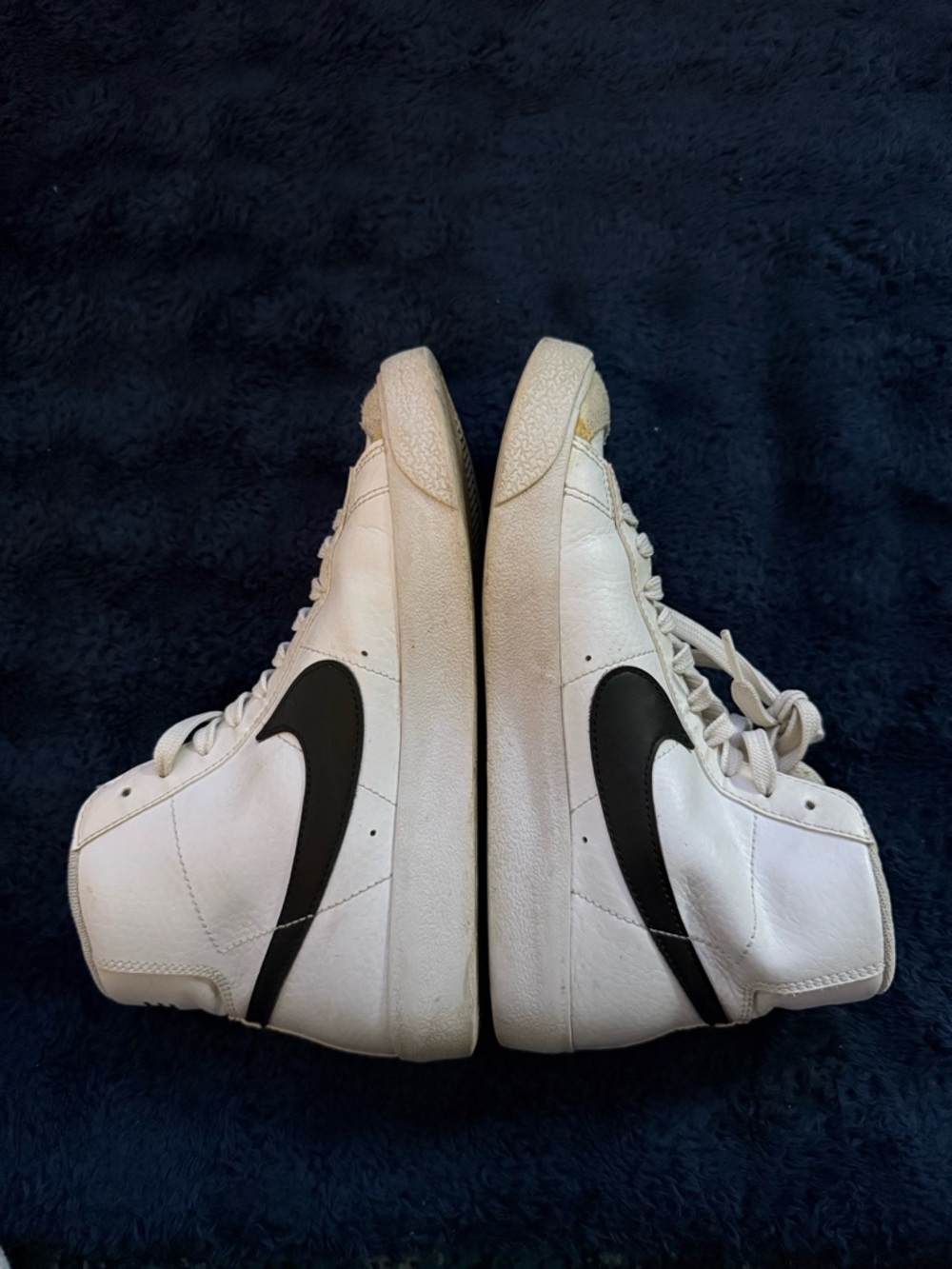 Nike Blazers White High-Top Sneakers with Black Swoosh Accents